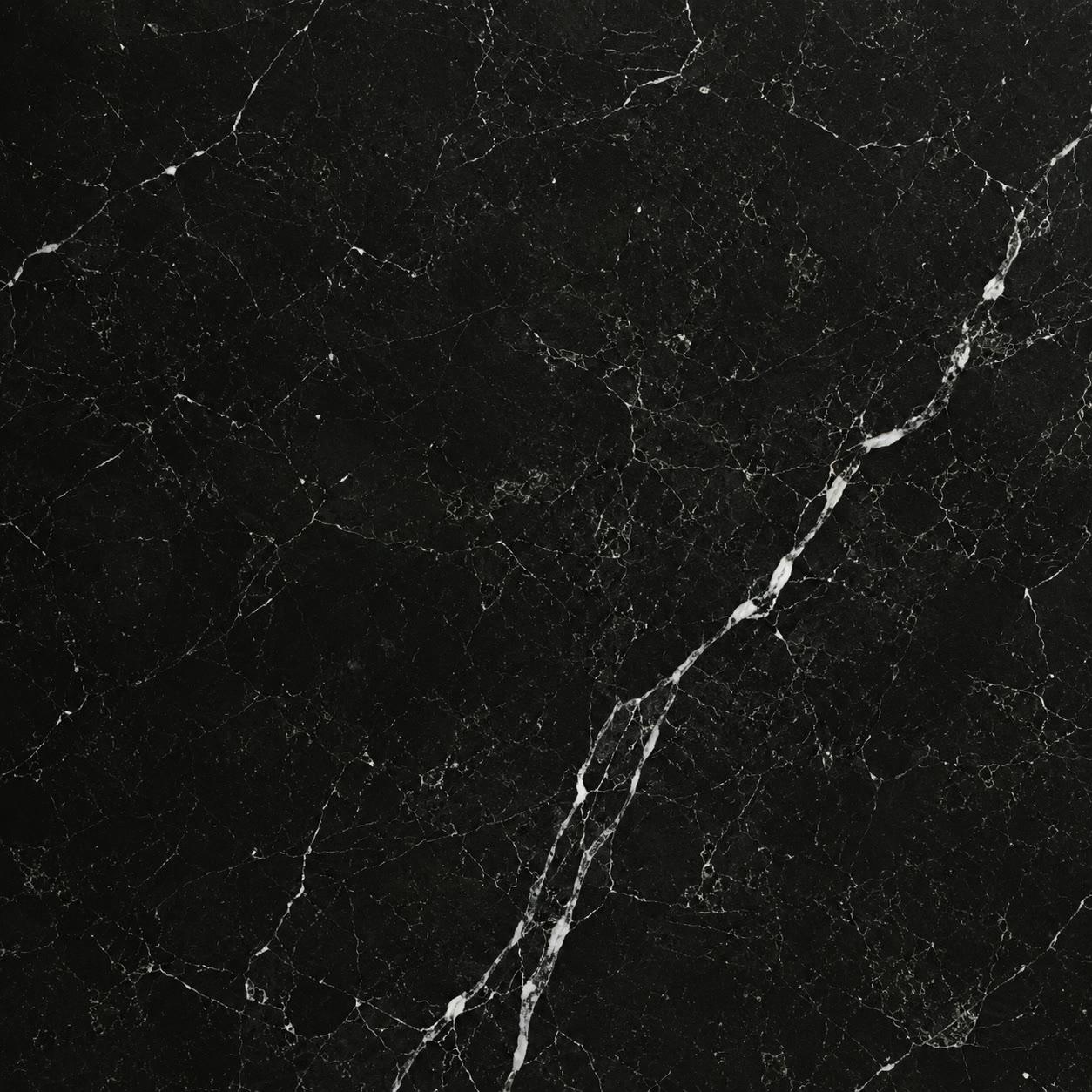 Nero Marble — Deep black stone with quiet veining. Anchors a room with weight and stillness.